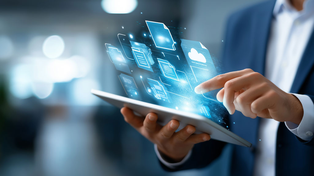 African HR professional managing EOR employee onboarding on laptop dashboard